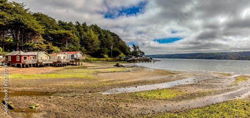 Cabins on the beach front of Tomales Bay photo