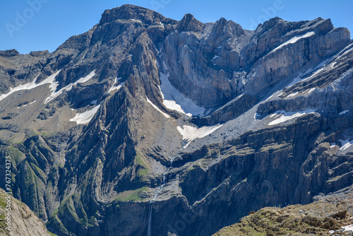 Cirque De Gavarnie, a beautiful waterfall and glacier in the French Pyrenees in summer with snow