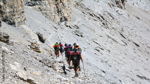 A group of hikers in Spanish Pyrenees, hiking in the mountains