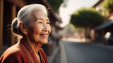 Portrait of happy asian elderly lady outdoor. Senior ethnic woman  with grey hair smiling  on nature