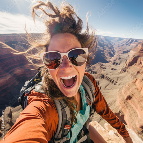  A smiling girl hiking and taking a selfie, capturing the essence of adventure and joy in the great outdoors.