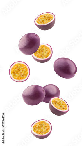 Falling passionfruit isolated on white background, full depth of field photo