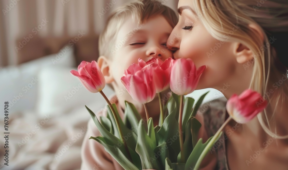 little child with tulips. Tender Mother-Son Moment with Pink Tulips