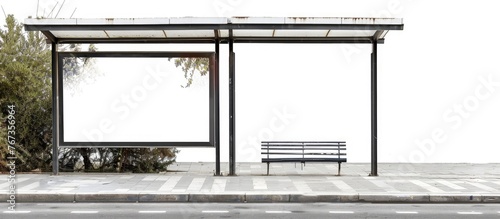 An ad space at a bus stop on the street with a white background. photo