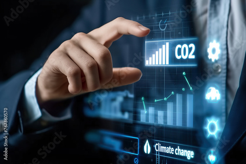 Climate change to limit global warming and sustainable development and green business. Businessman touching carbon reduction icon on virtual screen