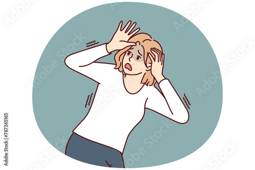 Frightened woman panicking and trying to dodge covering head with hands feeling danger and threat. Frightened girl screaming in fear suffering from phobia or panic attacks due to psychological problem