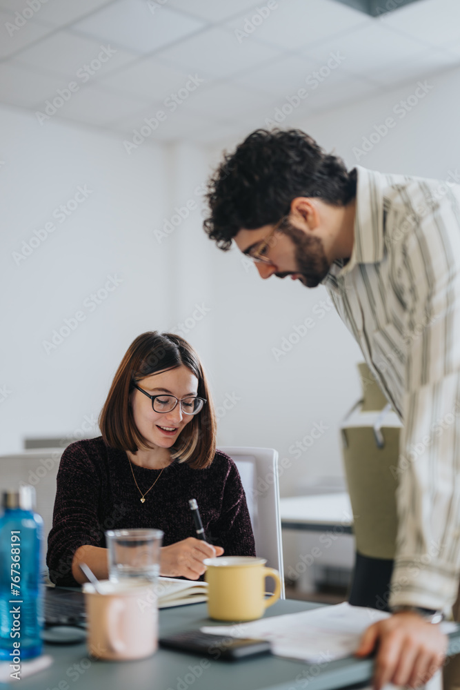 Young coworkers discuss business expansion, strategize marketing plans, and analyze statistics to achieve profit growth in a creative office. Young coworkers discuss business expansion, strategize marketing plans, and analyze statistics to achieve profit growth in a creative office.