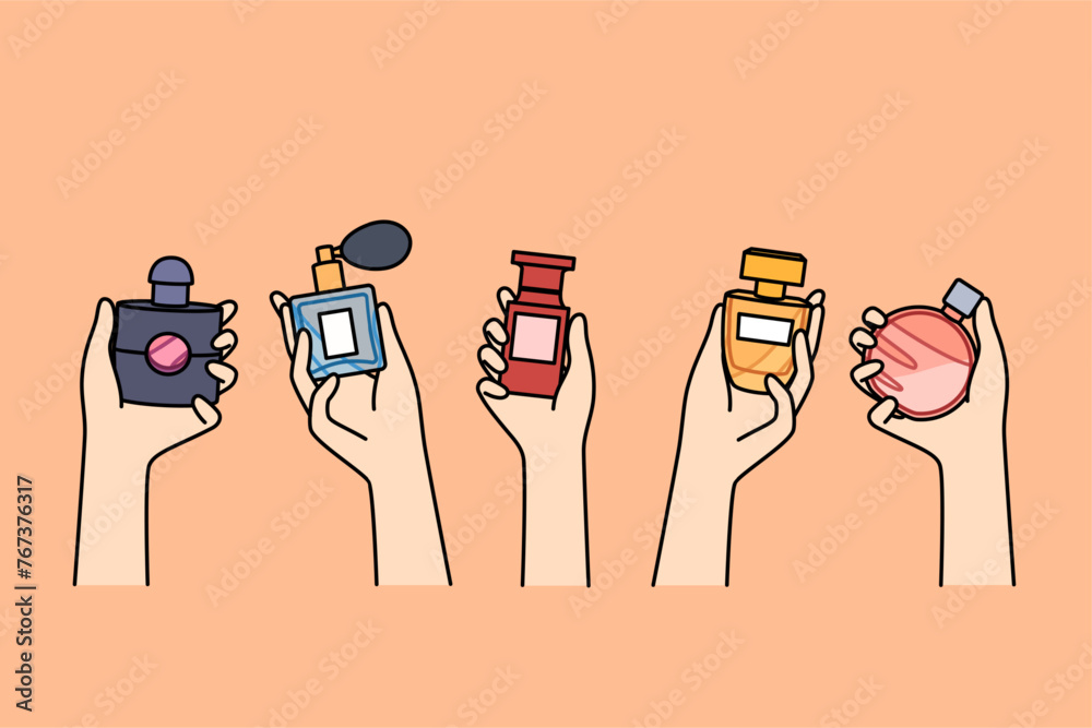 Bottles of perfume in hands of women choosing new scent to create desired look when going to party. Assortment of fragrances in perfume shop, with various essences and extracts for eau de toilette