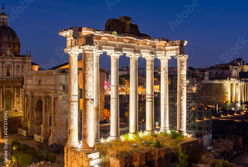 Temple of Saturn in Roman Forum at night, Rome, Italy photo