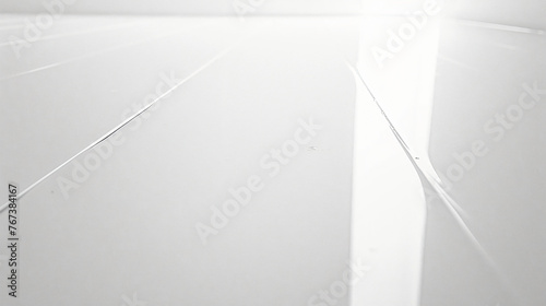 A stark white background with a glossy finish creating a modern and high-tech look.