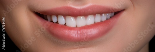 Close up shot of a woman s smile with white healthy teeth  Banner for dentistry or dentist advertising  healthy teeth concept
