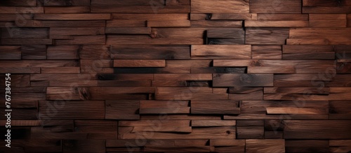 A close up of a brown hardwood plank wall made of composite materials resembling brickwork. The wood stain enhances the natural beauty of the wood