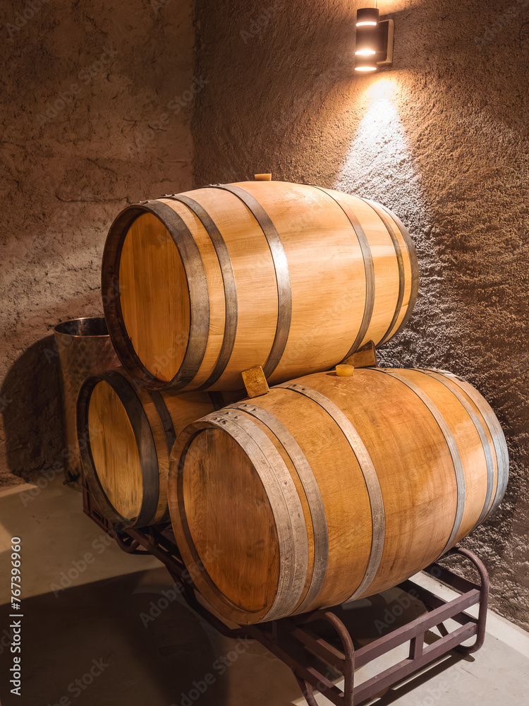 Aged Wooden Wine Barrels in a Rustic Cellar