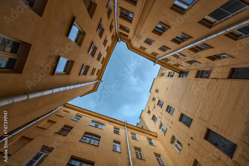 View up into the sky from the courtyard-well in St. Petersburg , Russia.