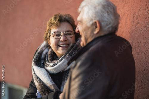 Elderly Couple Sharing a Moment of Joy Outdoors