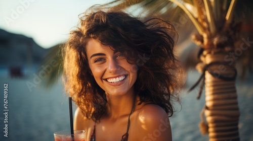 happy young woman in resort having a summer cocktail