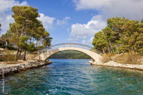Big stone bridge in Veliko jezero in the Mljet National Park, Croatia photo
