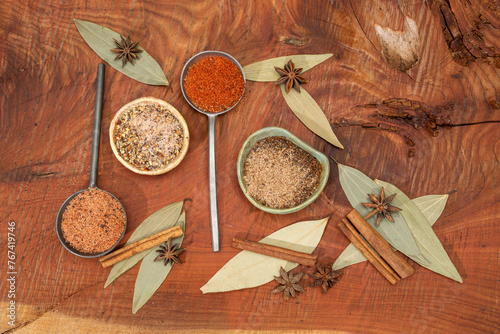 spices and herbs on wooden background