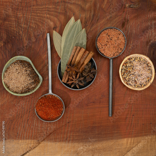 spices and herbs on wooden table