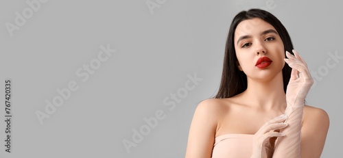 Beautiful young woman with ...