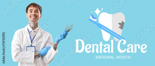 Male dentist with tools on ...