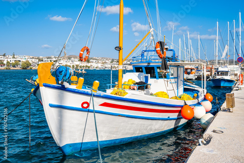 Traditional Greek fishing boat in Adamas port, Milos island, Cyclades, Greece