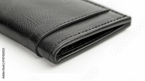 Wallet made of black genuine leather, isolated on a white background. Close-up of an expensive man's purse