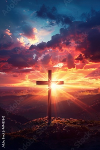 Cross on the top of the mountain at sunset. Conceptual image