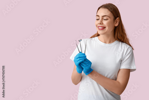 Female dentist with dental ...