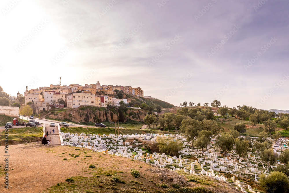 Fez, Morocco - March 17, 2024: Green Hill and muslim tombs viewed from Borj Nord Area, The ancient city of Fez, The oldest capital of Morocco