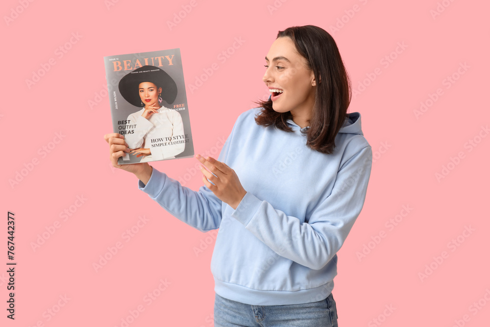 Young woman with beauty magazine on pink background Young woman with beauty magazine on pink background