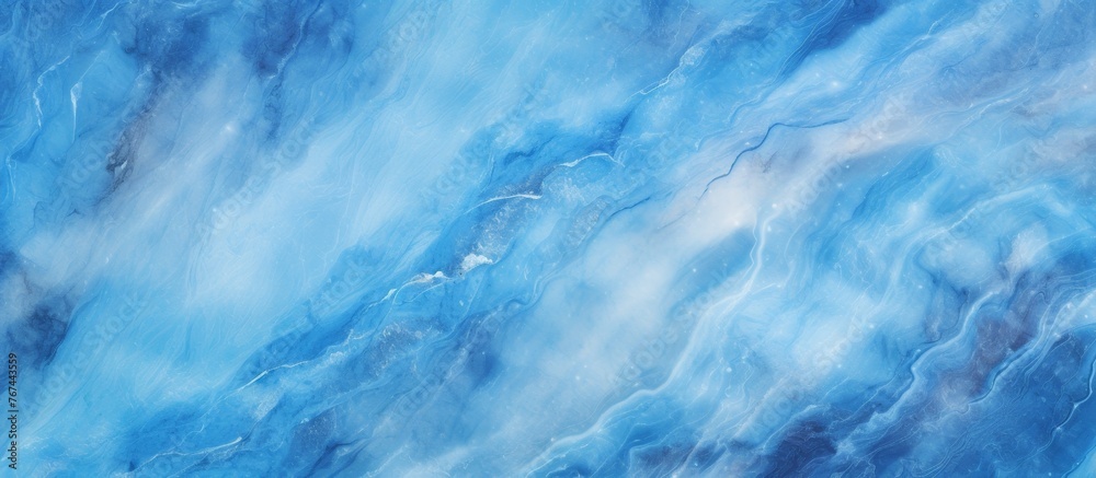 A close up of a blue and white marble texture resembling a cumulus cloud in an electric blue sky. The pattern mimics a meteorological phenomenon in a natural landscape with the horizon in view