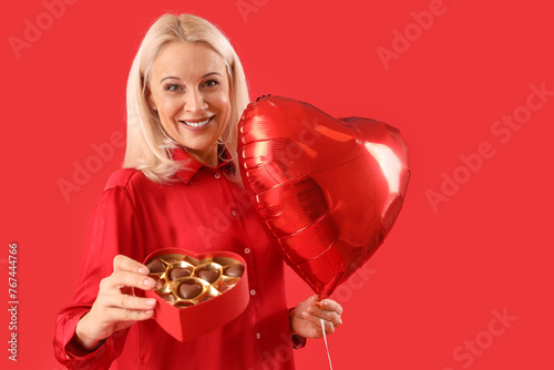 Mature woman with heart-sha...