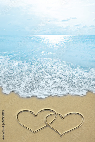 sea sky clouds sand traces drawing of hearts