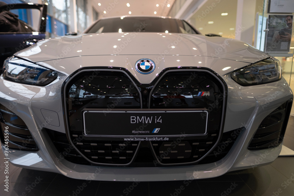 grey BMW i4 five-door electric liftback class D, German manufacturer ...