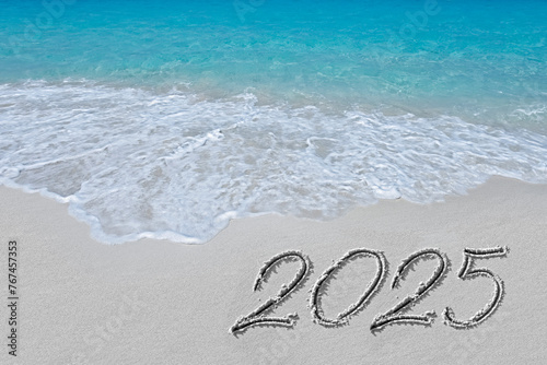 wave and inscription on the sand 2025