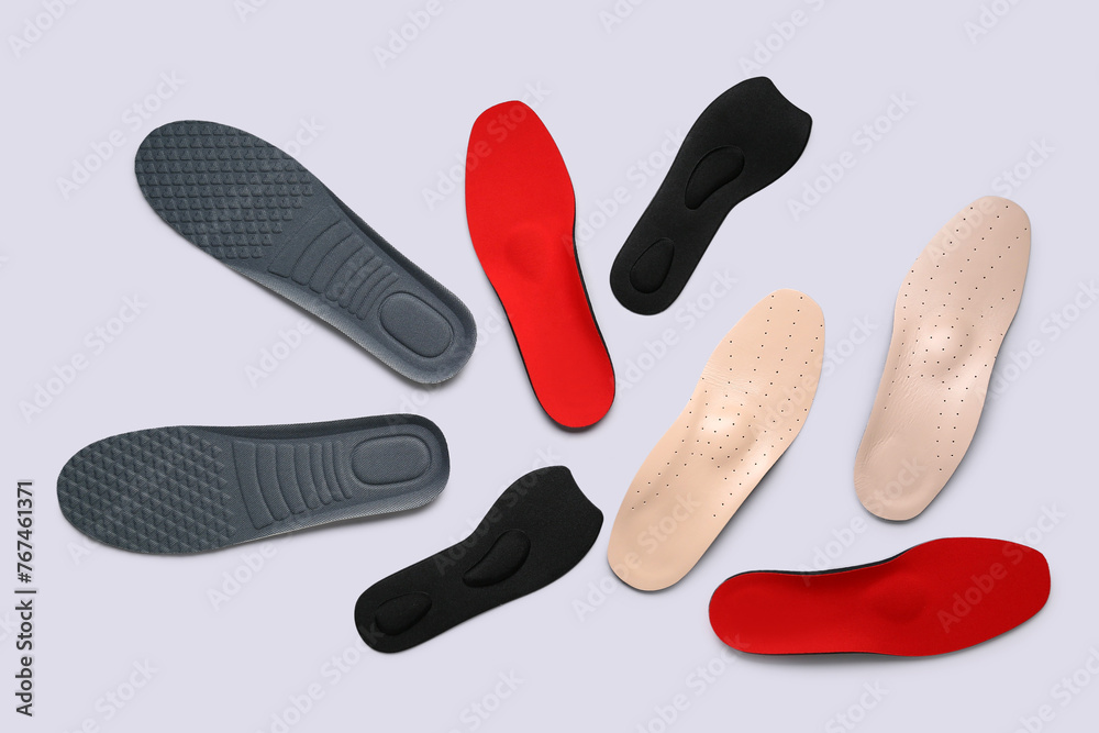 Many orthopedic insoles isolated on white background Many orthopedic insoles isolated on white background