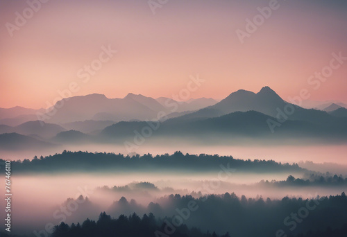 Misty sunrise silhouette over a mountain range pastel colours