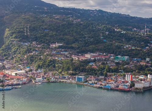 Aerial view of Jayapura city which looks beautiful on the edge of the bay. Jayapura is the capital of Papua Province, Indonesia.