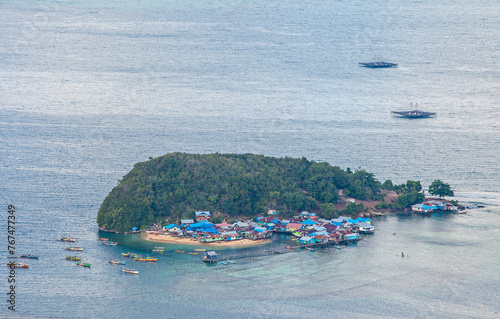 Aerial view of residential areas on small islands in Yos Sudarso Bay, around Jayapura City, Papua, Indonesia. Jayapura is the capital city of Papua Province.