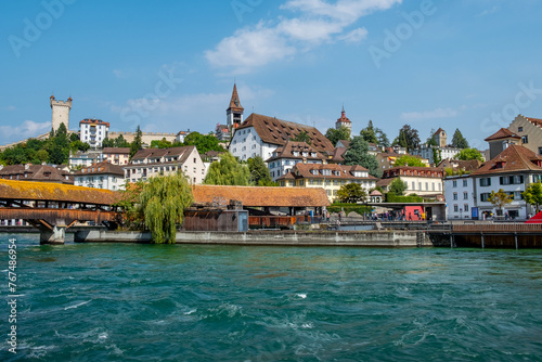 Picturesque and colorful river crossing in Old Town Lucerne