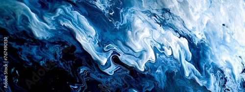 Close-up of blue and white liquid flowing