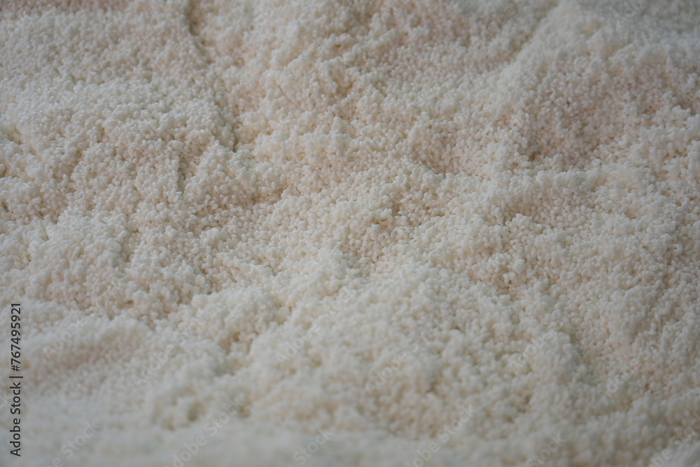 Kyoto, Japan - Feburuay 21, 2023: Steamed rice for sake brewing Kyoto, Japan - Feburuay 21, 2023: Steamed rice for sake brewing
