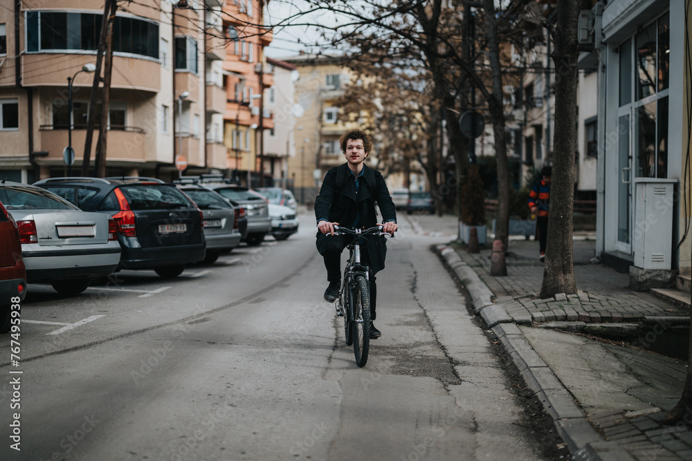 Professional male cyclist in business attire riding a bicycle on an urban street, promoting sustainable transportation.