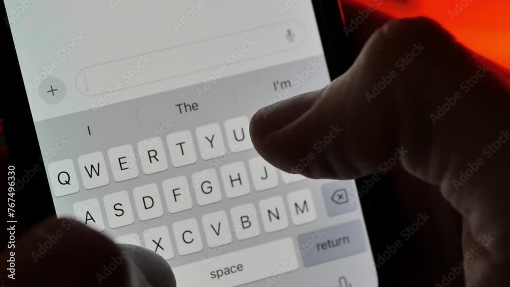Slow-motion of a person typing 