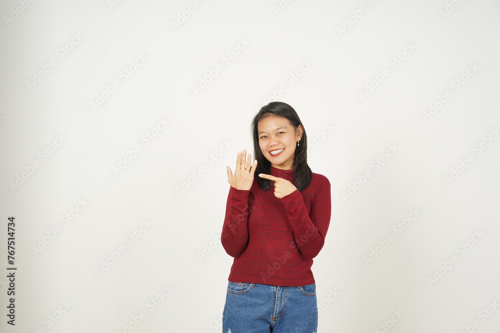 Young Asian woman in Red t-shirt Smiling and showing ring isolated on white background Young Asian woman in Red t-shirt Smiling and showing ring isolated on white background