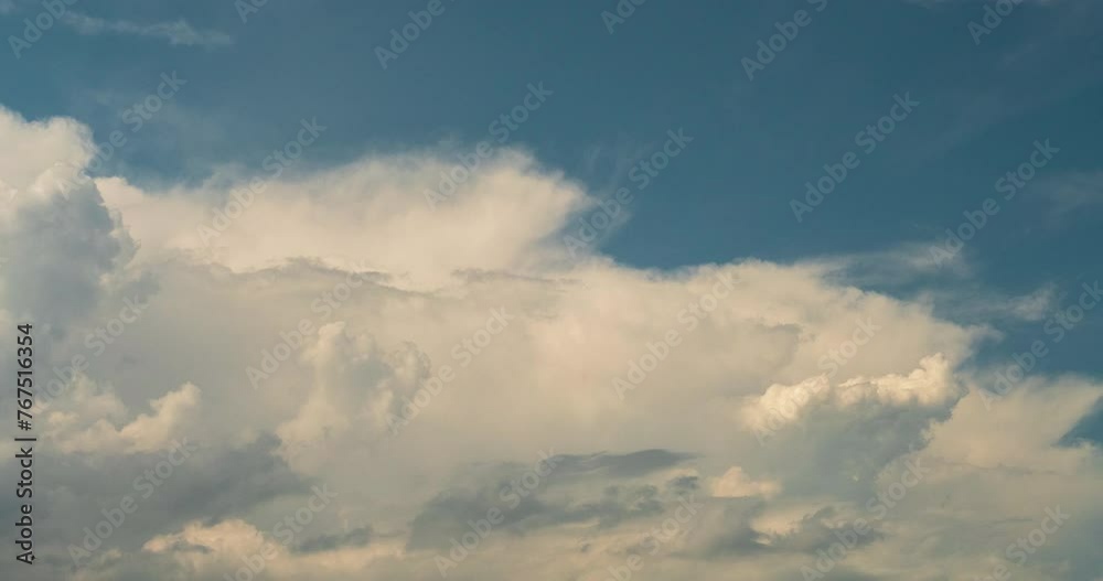 Timelapse Blue sky fluffy white clouds on summer season bright clear skyline with beautiful cloudscape. Timelapse Panorama blue sky clouds heaven on daylight with copy space. Cloudscape sunny day. Timelapse Blue sky fluffy white clouds on summer season bright clear skyline with beautiful cloudscape. Timelapse Panorama blue sky clouds heaven on daylight with copy space. Cloudscape sunny day.