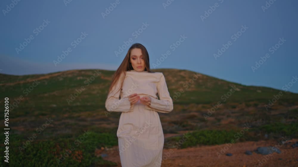 Active dancer performing nature green hills at summer evening. Woman dancing Active dancer performing nature green hills at summer evening. Woman dancing