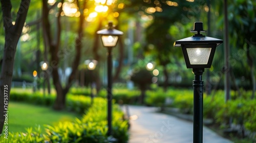 A spacious public park with lampposts that are equipped with solar panels providing ecofriendly lighting for visitors to enjoy even . AI generation.