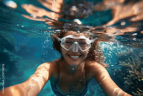 Happy girl underwater with goggles, bubbly and bright © InfiniteStudio